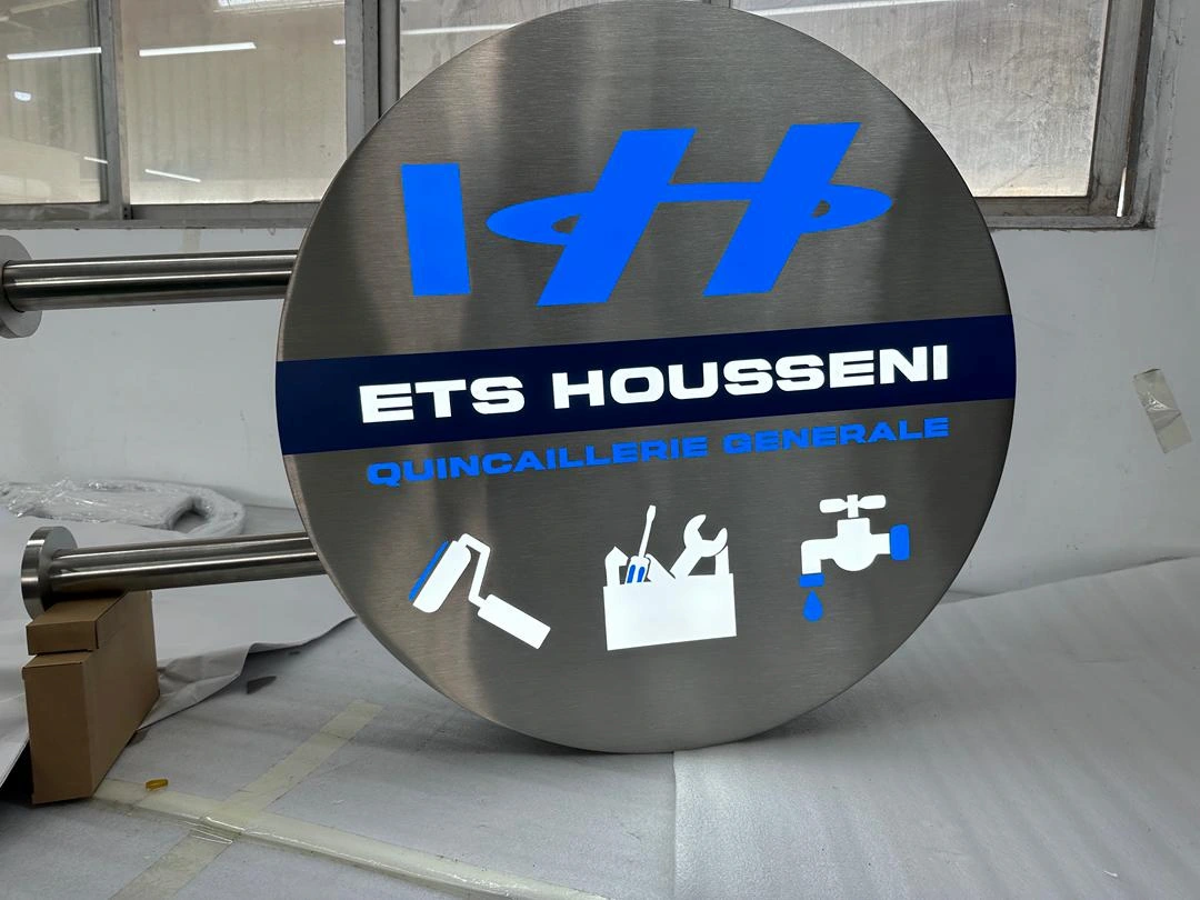 Enseigne drapeau tôle ajourée LED - ETS Housseni